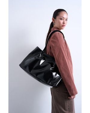 TOPSHOP Tubler Patent Faux Leather Tote - Black