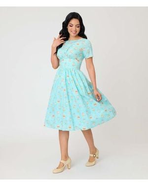 Unique Vintage Smocked Back Swing Dress - Blue