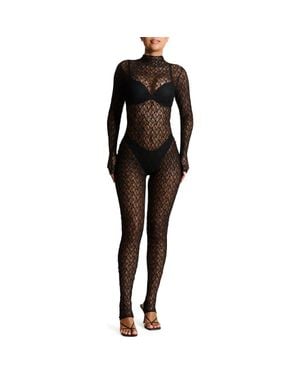 Naked Wardrobe Sheer Lace Long Sleeve Stirrup Jumpsuit - Black