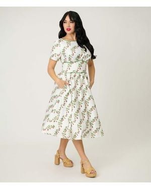 Unique Vintage Smocked Back Swing Dress - Natural