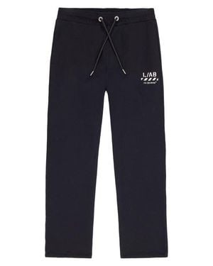 L/AB Off White Diagonal Stripe Logo Cotton French Terry Sweatpants - Blue