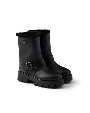 Prada Leather And Shearling Booties - Black