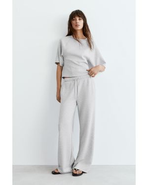 Pull&Bear Pantaloni Wide Leg, Morbidi Al Tatto - Bianco