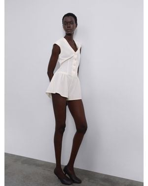 SÉLONE Elara V-Neck Mini Jumpsuit - White
