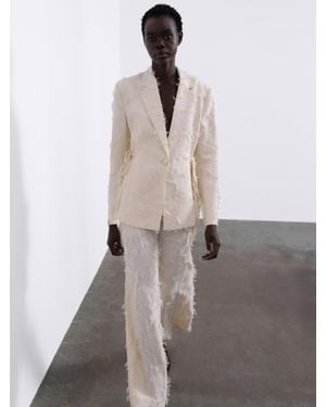 SÉLONE Jora Fringe Trousers - White