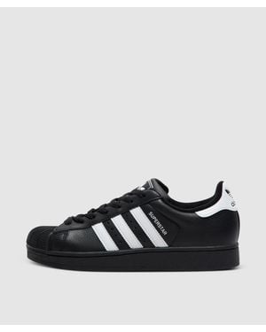 Designer Black Adidas Core Shoes for Women - Up to 49% off | Lyst