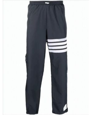 Thom Browne Sleek Training Jogger Pants With Distinctive Stripes - Blue