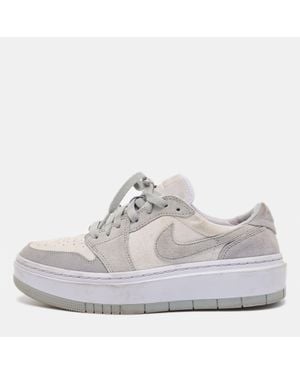Nike Air Jordans/ Suede Elevate Air Jordan 1 Low Top Sneakers - White