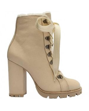 SCHUTZ SHOES Faux Fur Lining Lug Sole Winter Leather Booties - Natural