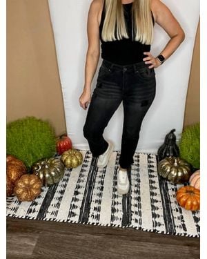 Risen Mid Rise Uneven Hem Jeans - Black