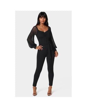 Bebe Printed Mesh Off Shoulder Catsuit - Black