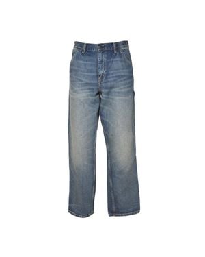 Carhartt Relaxed Fit Denim Jeans With Subtle Distressing And Patch Pockets - Blue