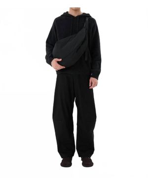 Shop Amomento Curved Zip Banding Pants - Black