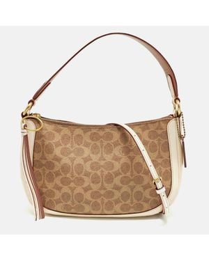 COACH Sutton Off/ Signature Coated Canvas And Leather Crossbody Bag - Brown