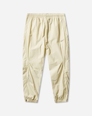 Nike Men S Nocta Woven Track Trousers Alabaster - Natural