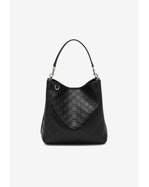 Gucci Medium Gg Embossed Bucket Bag - Black