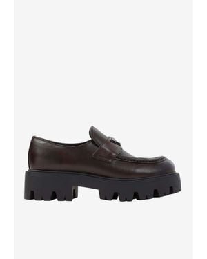 Prada Stride Leather Penny Loafers - Black