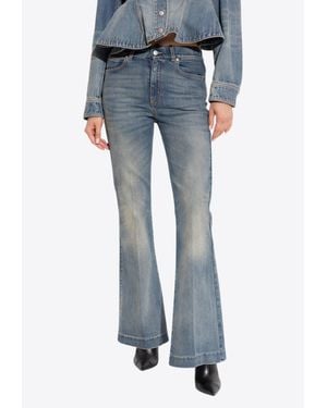 McQueen Flared-Leg Faded Jeans - Blue