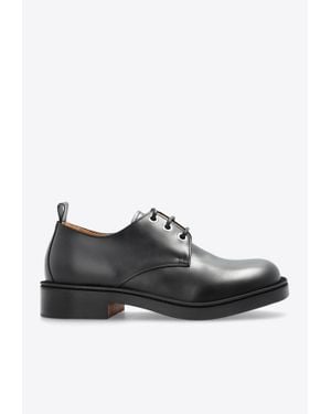 McQueen Skull-Embossed Leather Derby Shoes - Black