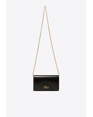 Chloé Iconic Leather Clutch in Black | Lyst Canada