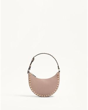 Valentino Garavani ロックスタッズ グレインカーフスキン ミニ ホーボーバッグ 女性 パウダー - ピンク