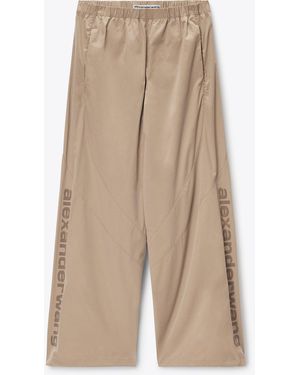 Alexander Wang Perforated Logo Mid-Rise Track Pants - Natural