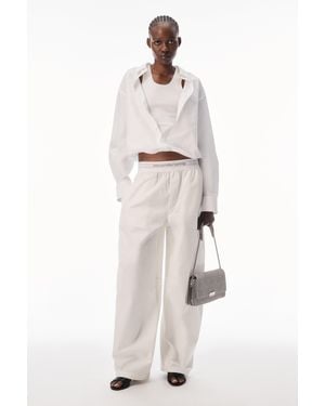 Alexander Wang Mid-Rise Pleated Wide-Leg Pant With Logo Elastic Waist - White