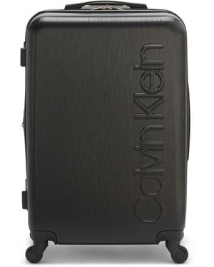 Calvin Klein Valigia leggera da donna rigida laterale verticale Spinner - Nero