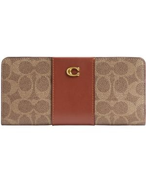 COACH Essential Slim Wallet In Signature Canvas - Brown