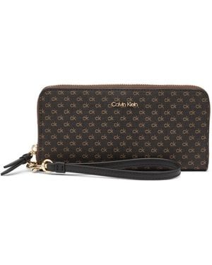 Calvin Klein Key Item Saffiano Continental Zip Around Wallet with Wristlet Strap Reisezubehör: Reisebrieftasche - Schwarz