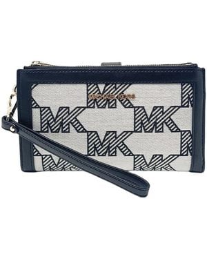 Michael Kors Jet Set Travel Large Double Zip Wallet MK Signature Multi Python Design in Schwarz Lyst DE