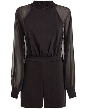 Guess Jumpsuit kurz mit transparenten Ärmeln - Schwarz