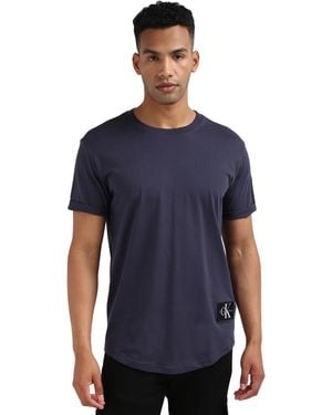 Calvin Klein Calvin Klein T-Shirt Kurzarm Badge Turn Up Sleeve Rundhalsausschnitt - Blau