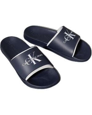 Calvin Klein Rubber Neoprene MONOLOGO YM0YM00361 Slides - Blau
