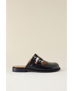 INTENTIONALLY ______ Varsity Mary Jane Mules - Black