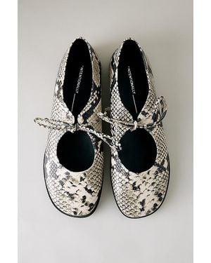 INTENTIONALLY ______ Snake Embossed Flats - Black