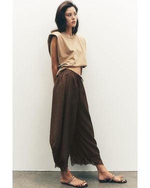 By Anthropologie Cropped Lace-Hem Trousers - White