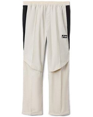 Asics CLASSIC WOVEN TRACK PANT - Negro