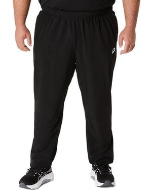 Asics CORE WOVEN PANT - Schwarz