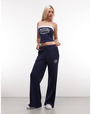 ASOS Weekend Collective Waffle Wide Leg Joggers With Graphic - Blue