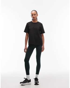 ARKET Leggings Deportivos Verde Oscuro Sin Costuras Con Bolsillos Laterales De