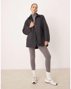 Tala Oversized Reversible Fleece And Quilted Jacket - Black