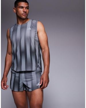 adidas Originals Adidas running - adizero - short avec imprimé - et gris - Bleu
