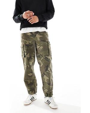 Superdry – parachute – leichte cargo-shorts - Grün