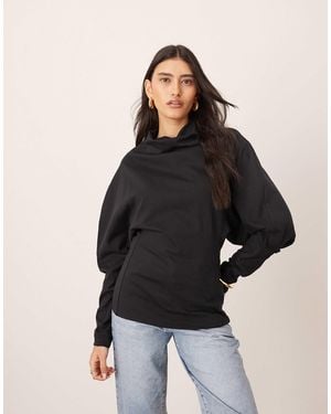 ARRANGE Sculptural Jersey Longline Top - Black