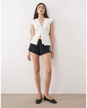 Miss Selfridge Varsity Mini Shorts With Frill Hem - White