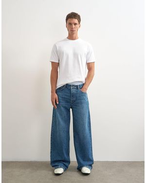 TOPMAN Jean coupe baggy rigide délavage moyen - Bleu