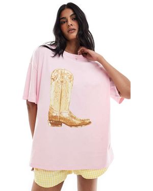 ASOS T-Shirt Oversize Tenue Con Grafica Di Stivali Da Cowboy - Rosa