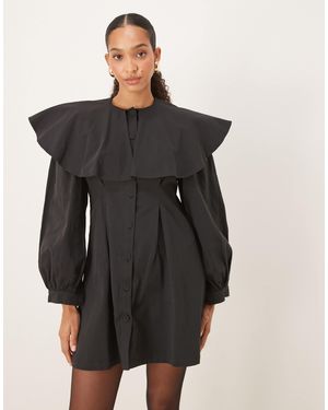 Ghospell Robe chemise courte style cape - Noir