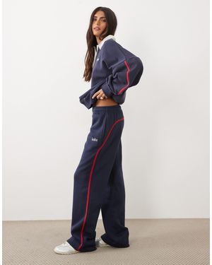 Kaiia Jogger im kombiteil mit seitlichem streifen, weitem bein, gesticktem logo-detail, baumwollmix, und rot - Blau
